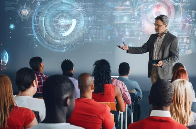 Instructor teaching students about technology