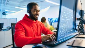 man using computer in an office